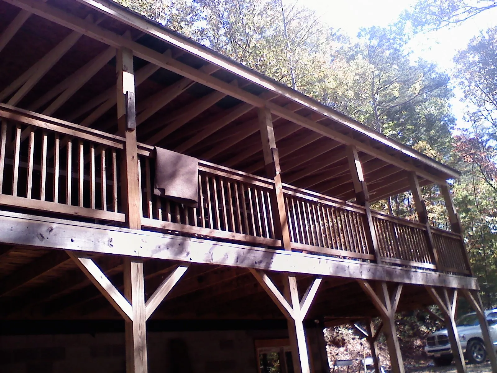 Timber framing under a new elevated porch and deck — Roof Leak Repair in Patoka by Roofing Brothers